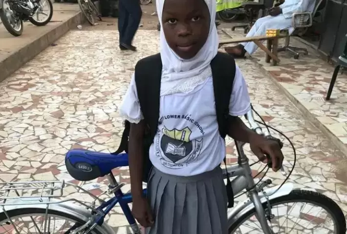 A girl with bicycle