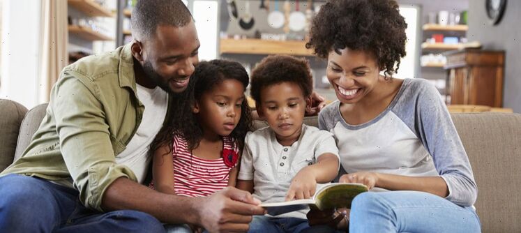 black family mentoring kids at home family time