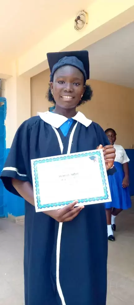 Girl holding a certificate