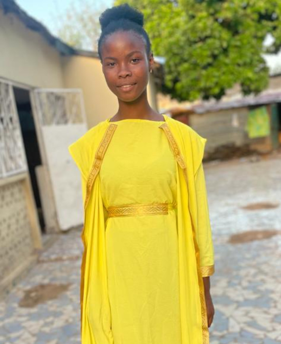 Girl wearing yellow dress