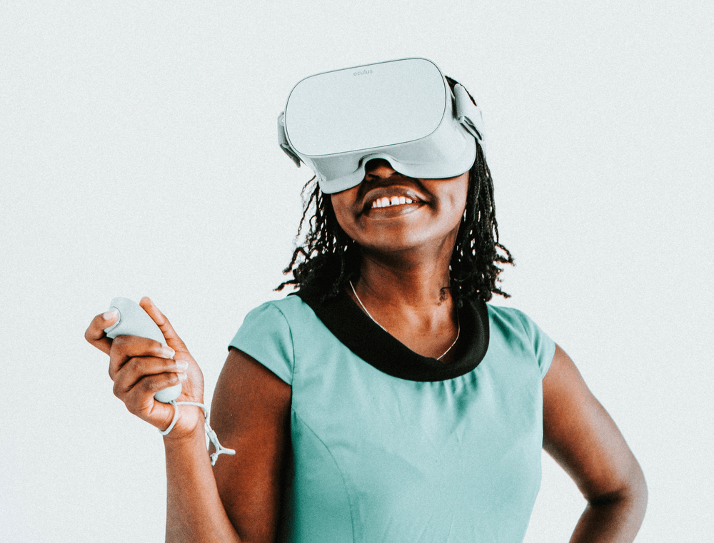 Black woman wearing VR headset 